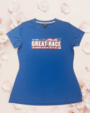 Royal blue women’s Great Race short sleeve running shirt with red and white chest graphic.